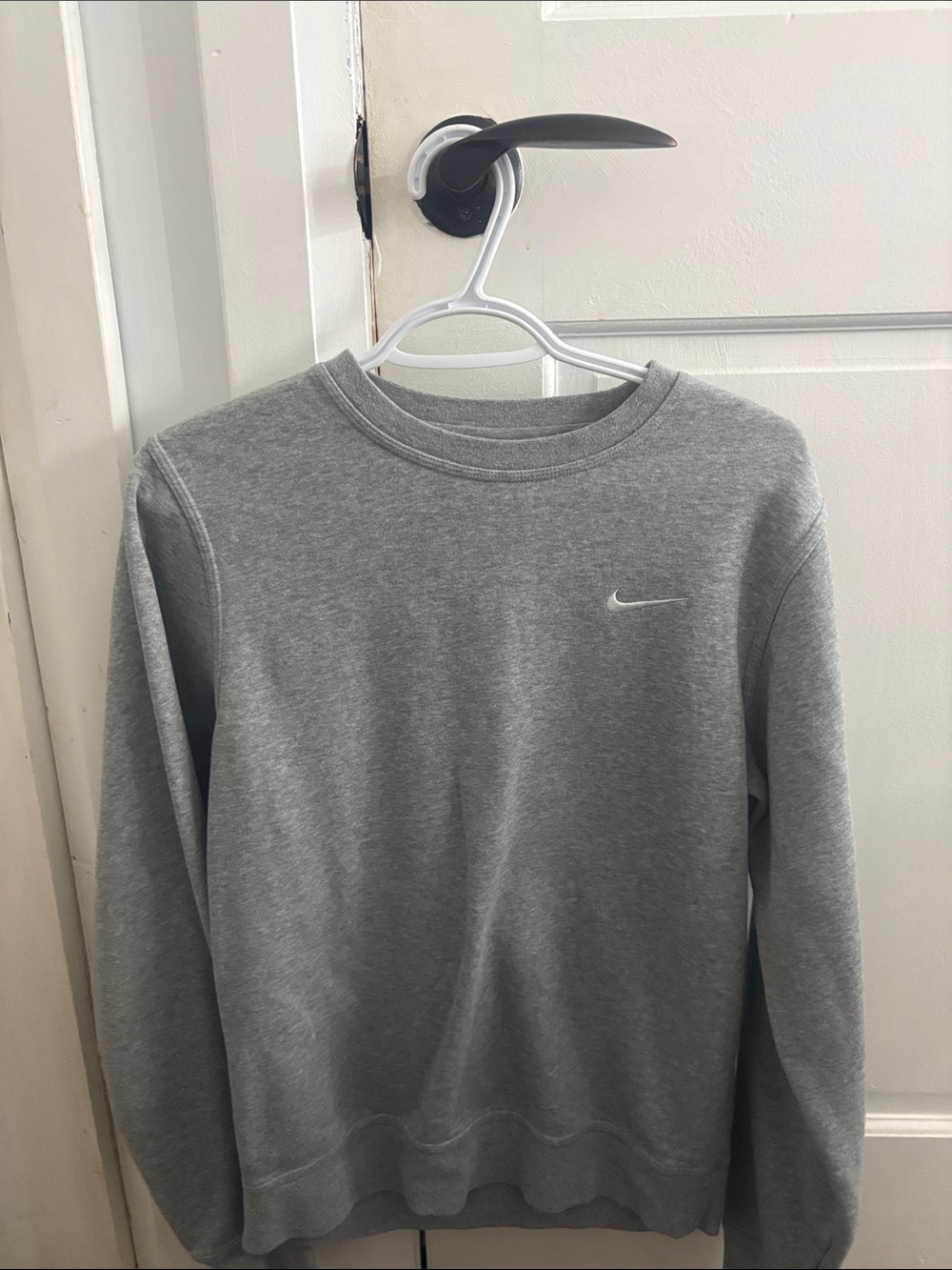 Nike Woman’s Heather Gray Crewneck Sweatshirt with White Swoosh